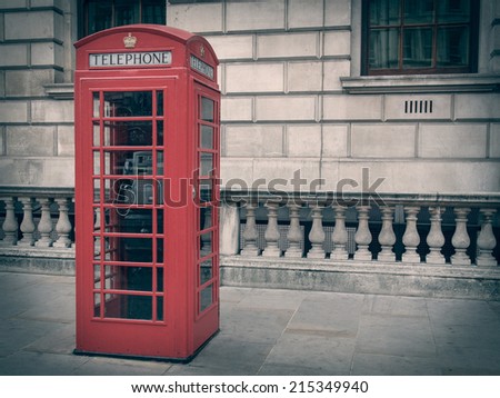 Vintage looking Traditional red telephone box in London UK