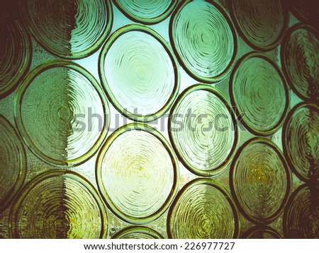 Vintage looking Decorated glass pane useful as a background