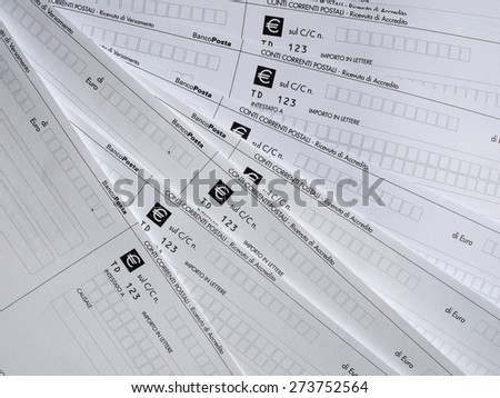 MILAN, ITALY - APRIL 2, 2015: Blank Italian postal order forms for payments, aka as Bollettino Postale in Italy