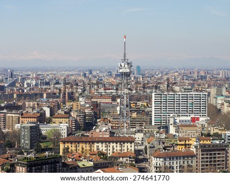 MILAN, ITALY - MARCH 28, 2015: The broadcasting tower of RAI Italian public television seen over the city skyline