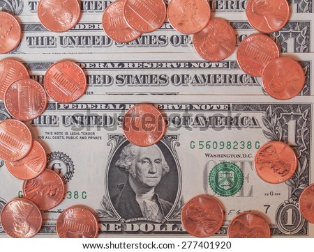 One cent coins and One Dollar banknotes  currency of the United States useful as a background