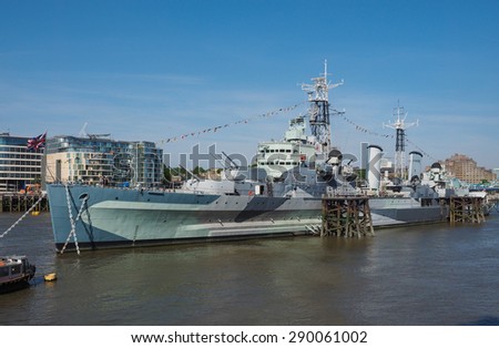LONDON, UK - JUNE 11, 2015: HMS Belfast ship originally a Royal Navy light cruiser is now permanently moored on the River Thames as a museum ship