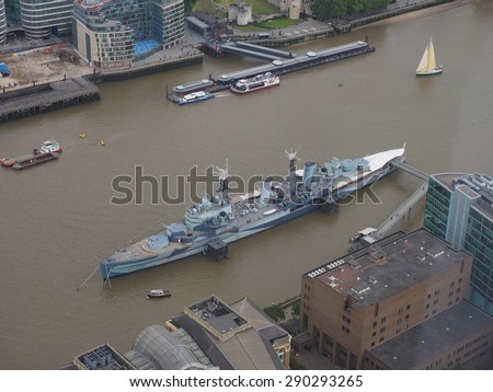 LONDON, UK - JUNE 10, 2015: HMS Belfast ship originally a Royal Navy light cruiser is now permanently moored on the River Thames as a museum ship