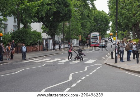 LONDON, UK - JUNE 10, 2015: Abbey Road zebra crossing made famous by the 1969 Beatles album cover