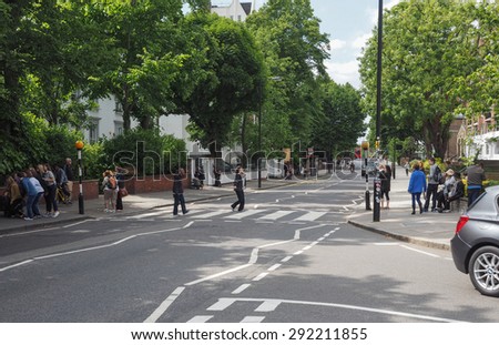LONDON, UK - JUNE 10, 2015: Abbey Road zebra crossing made famous by the 1969 Beatles album cover