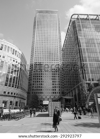 LONDON, UK - JUNE 10, 2015: Workers at the Canary Wharf business centre which is the largest business district in the United Kingdom in black and white