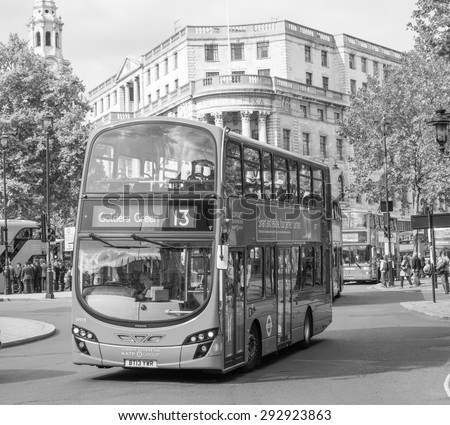 LONDON, UK - JUNE 09, 2015: Red double decker buses are a traditional landmark of London in black and white
