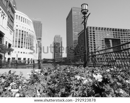 LONDON, UK - JUNE 11, 2015: The Canary Wharf business centre is the largest business district in the United Kingdom in black and white