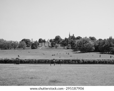 LONDON, UK - JUNE 11, 2015: Visitors at Greenwich park on Royal Observatory hill in black and white