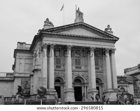 LONDON, UK - JUNE 12, 2015: People visiting the Tate Britain art gallery in black and white