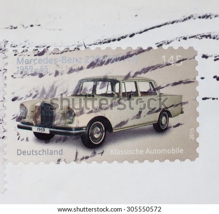 BERLIN, GERMANY - JULY 31, 2015: Stamps printed by Germany show a classic Mercedez Benz car