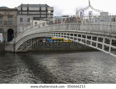DUBLIN, IRELAND - MARCH 01, 2009: The Liffey Bridge is commonly known as Ha penny Bridge meaning Half Penny Bridge since pedestrians had to pay a toll to cross it since its construction in 1816