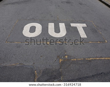 Out sign on tarmac in the street