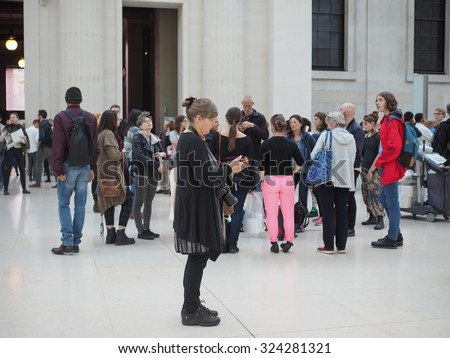 LONDON, UK - SEPTEMBER 28, 2015: Tourists in the Great Court at the British Museum designed by architect Lord Norman Foster opened in year 2000