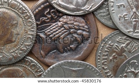 A heap of many ancient Roman coins (16:9 aspect ratio)