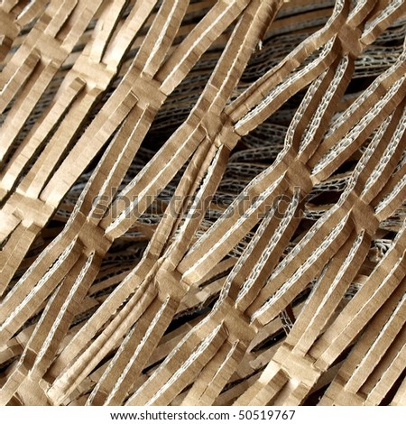 Ecological insulation material for packet packaging made of recycled corrugated cardboard