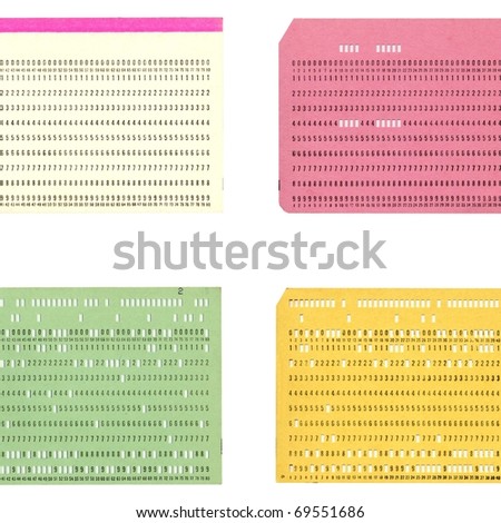 Vintage punched card for computer data storage isolated over white