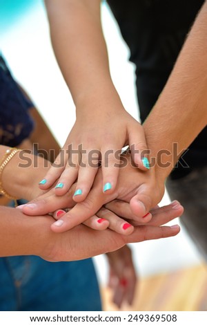 Stack of hands - real people agreement