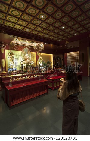 SINGAPORE - NOV 03 : Buddha Tooth Relic Temple on Nov 03, 2012 in Singapore. The temple is based on the Tang dynasty architectural style and built to house the tooth relic of the historical Buddha