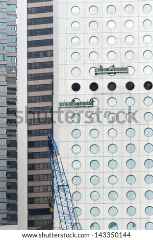 HONG KONG - JUNE 28 : round windows of Jardine House in Central on June 28 2012. It is the Hong Kong\'s first modern skyscraper. the round windows is one of the characteristic