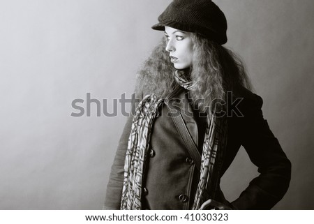 fashion model in autumn/winter clothes. High contrast photo