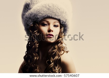 portrait of a beautiful lady in fur cap