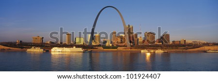 This is the St. Louis skyline at sunrise. It is situated along the Mississippi River.