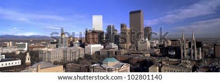 This is the Denver skyline, State Capitol and Rocky Mountains. It shows morning light on what is known as the Mile High City.