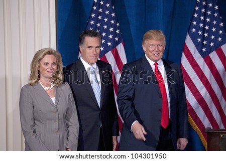 LAS VEGAS - FEB 2: Mitt Romney (C) stands with his wife, Ann Romney, and Donald Trump at Trump\'s hotel on February 2, 2012 in Las Vegas, Nevada. Trump is endorsing Romney for president.