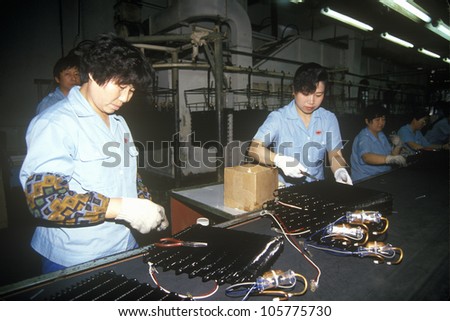 CIRCA 1994 - Factory workers at Shanghai Shangling Electric Appliances Company, Ltd., in Shanghai, People's Republic of China