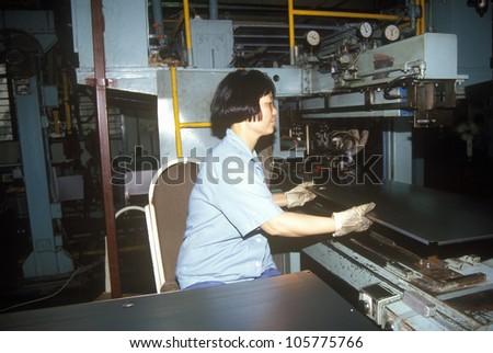 CIRCA 1994 - Factory workers at Shanghai Shangling Electric Appliances Company, Ltd., in Shanghai, People\'s Republic of China