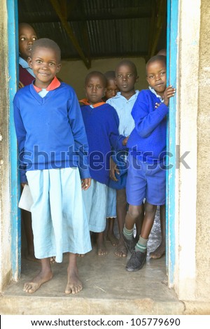 JANUARY 2005 - Children in blue uniforms at school near Tsavo National Park, Kenya, Africa