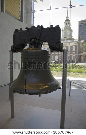 MAY 2007 - The Liberty Bell displaying crack in Liberty Bell Center with Independence Hall in the background, Philadelphia, Pennsylvania