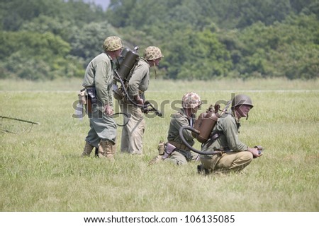 World War II reenactment of a battle between American infantryman and German soldiers, at Mid-Atlantic Air Museum World War II Weekend and Reenactment in Reading, PA held June 18, 2008