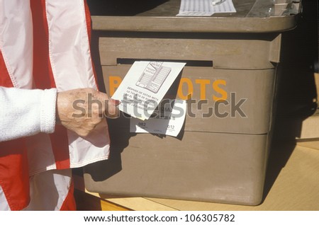 CIRCA 1998 - Casting Vote into ballot box