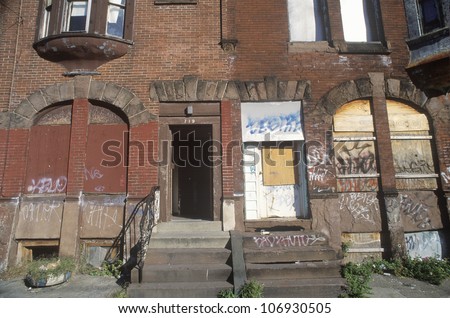 CIRCA 2002 - Front stoop of abandoned brick apartment, Philadelphia, Pennsylvania