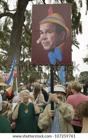 Depiction of President George W. Bush as Pinocchio painted on a sign at an anti-Iraq War protest march in Santa Barbara, California on March 17, 2007