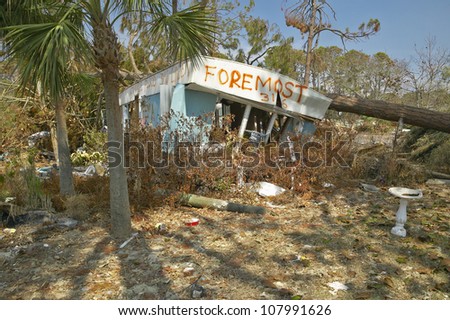 Foremost Insurance sign in front of destroyed house from Hurricane Ivan in Pensacola Florida