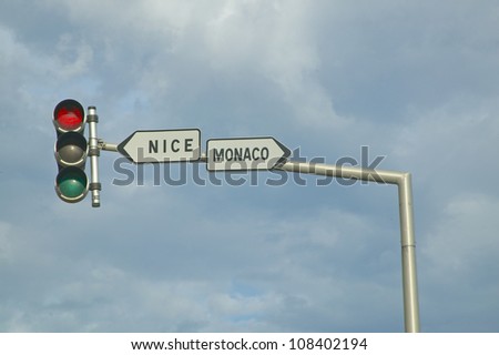 Stop light with direction sign