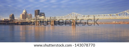 George Rogers Clark Memorial Bridge over the Ohio River with Louisville skyline in the background, KY