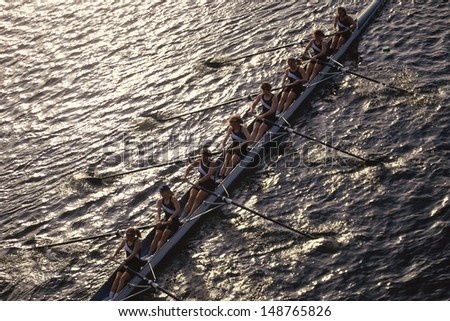 CHARLES RIVER, BOSTON, MA  - CIRCA 1989: Crew team rowing boat on Charles River in Boston, MA