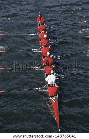 CHARLES RIVER, BOSTON, MA  - CIRCA 1990\'s: Crew team rowing boat on Charles River in Boston, MA