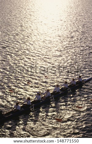 CHARLES RIVER, BOSTON, MA  - CIRCA 1989: Crew team rowing boat on Charles River in Boston, MA