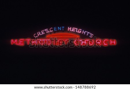 WEST HOLLYWOOD, LA, CA - CIRCA 1990\'s: A neon sign that reads `crescent heights Methodist church` in West Hollywood, CA