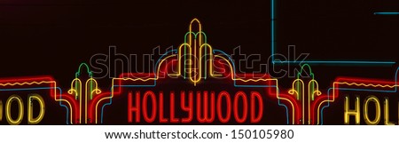 LOS ANGELES - CIRCA 1990\'S: Neon Hollywood sign in panoramic format in Hollywood, Los Angeles, California