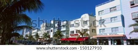 MIAMI BEACH, FLORIDA - CIRCA 1990\'S: Art-deco buildings along South Beach in Miami Beach, FL