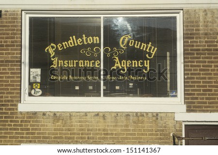 WEST VIRGINIA - CIRCA 1980\'s: The storefront of an Insurance agency, West VA