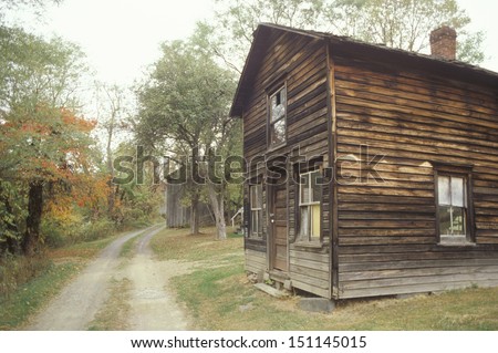 PENNSYLVANIA - CIRCA 1980\'s: Old wooden, house on a dirt road, PA