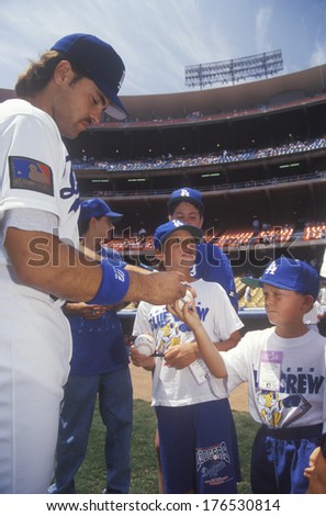 LA Dodger Catcher Mike Piazza signs autographs and balls for young fans, Dodger Stadium, Los Angeles, CA
