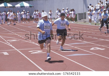 Special Olympics athletes running race, UCLA, CA